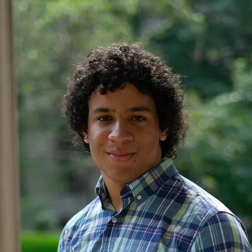 a headshot image of Colin Clark